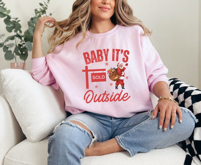 Funny real estate agent Christmas shirt, "Baby It's Sold Outside," with retro Santa and SOLD sign. Perfect realtor gift.
