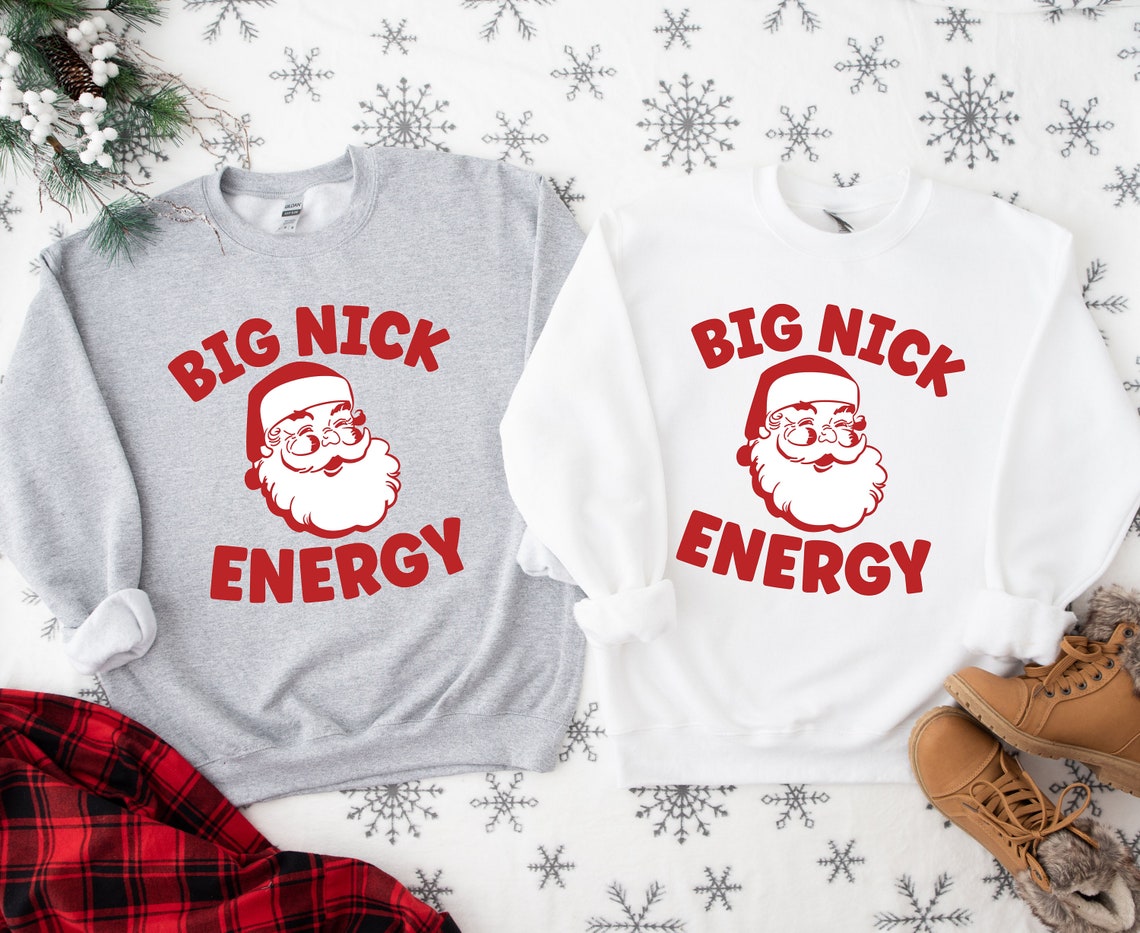 Funny "Big Nick Energy" Christmas T-shirt with retro Santa face, perfect for holiday parties and Xmas humor gifts.